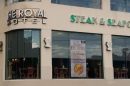 The Royal Hotel building with steak and seafood signage in Upper Ferntree Gully.